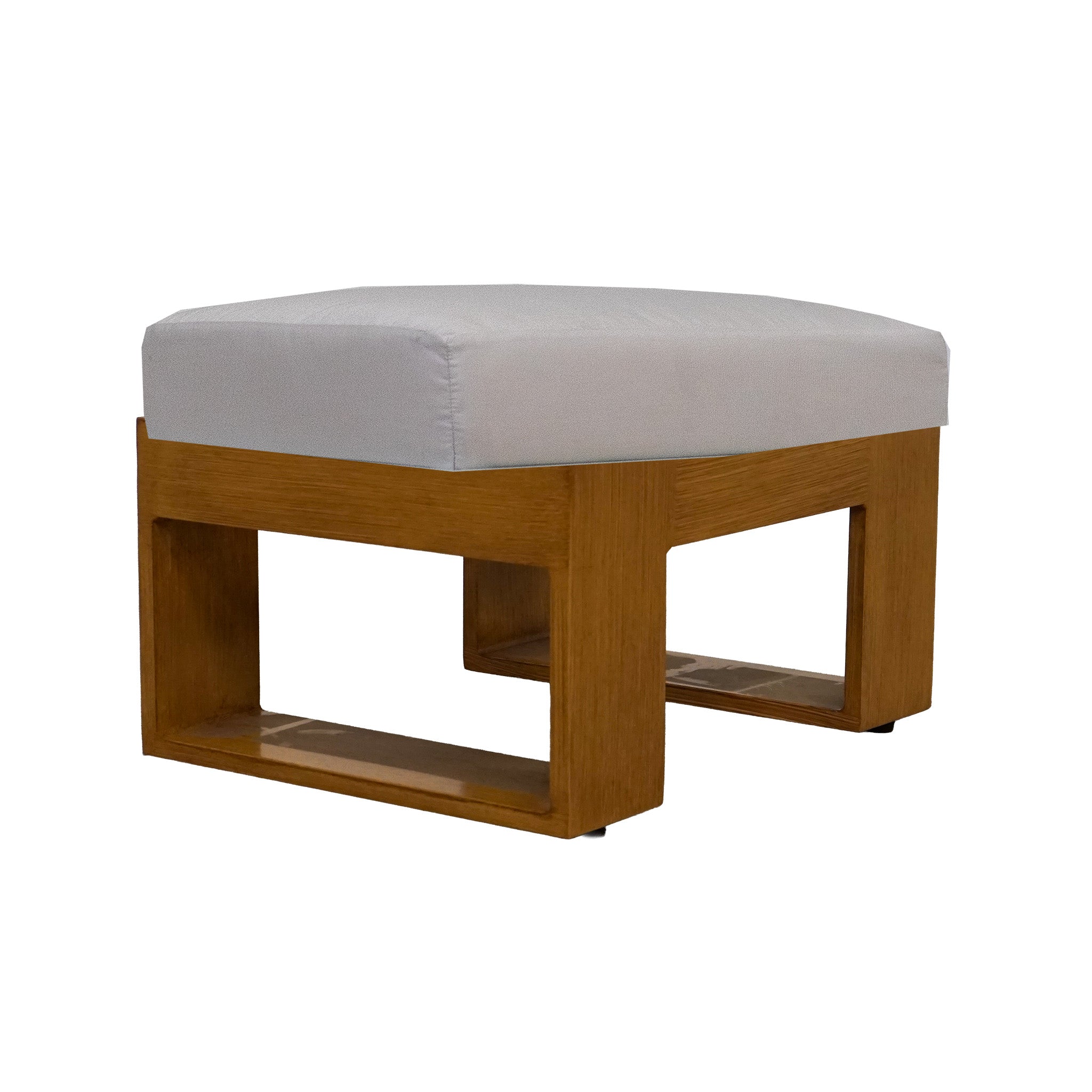 Faux teak wood colored ottoman with an off white cushion on a white background