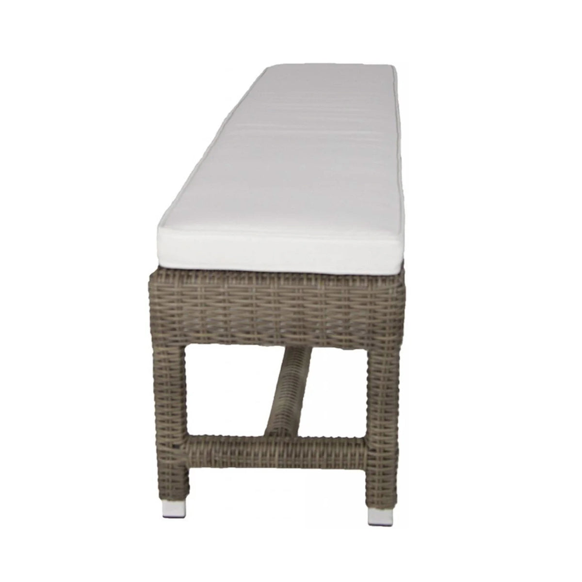 Side view of a wicker bench with a white cushion on a white background