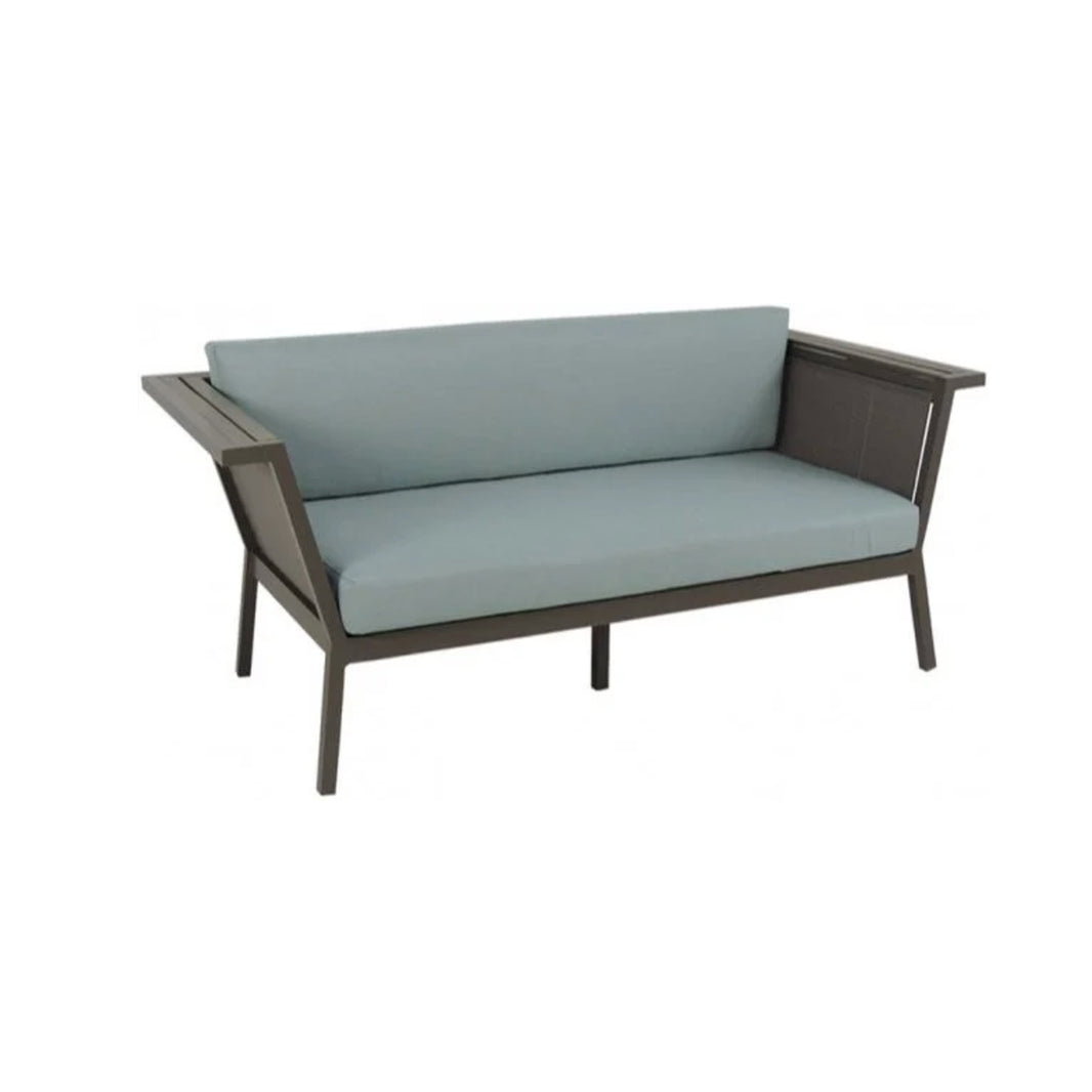 Grey outdoor loveseat with light blue cushions on a white background