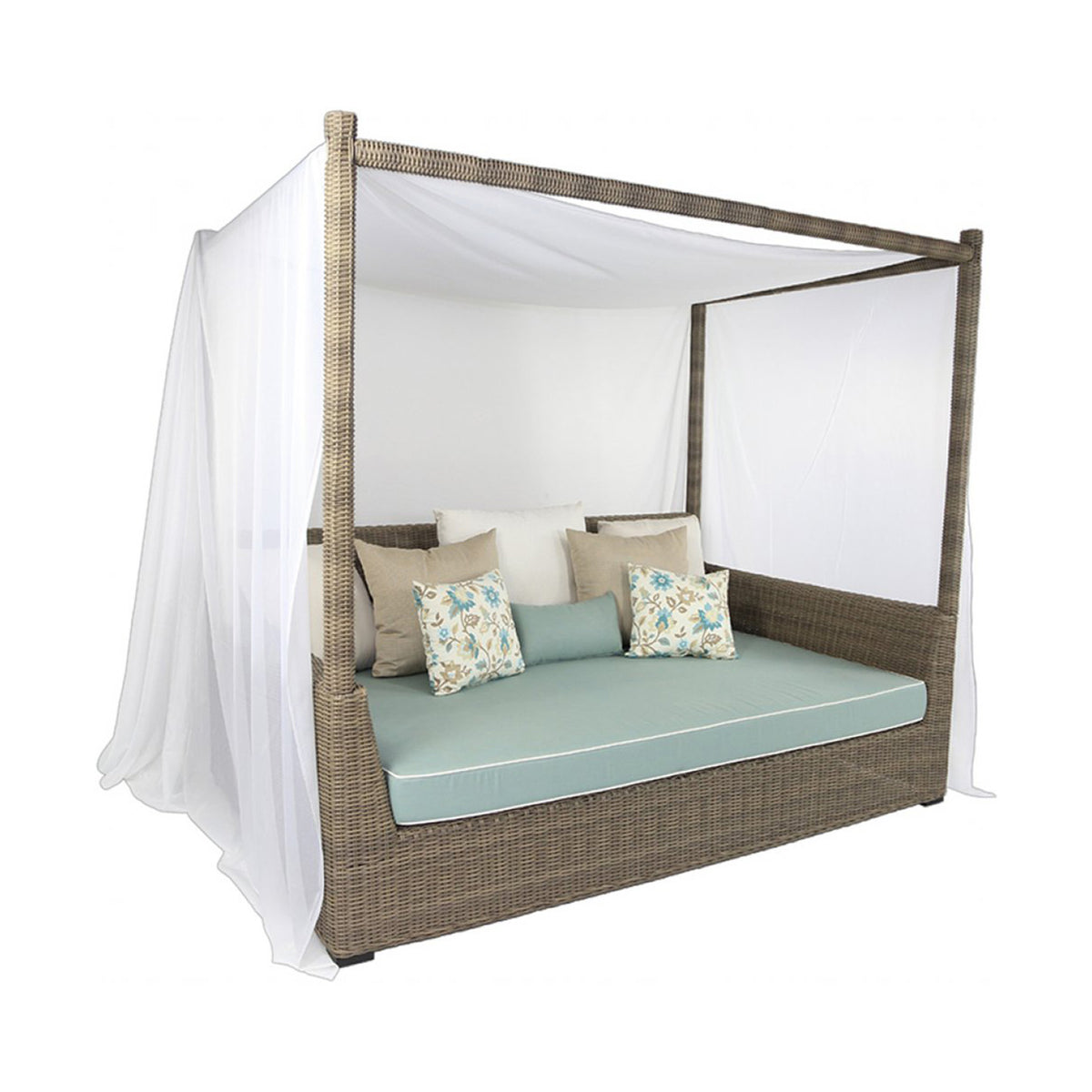 Wicker daybed with canopy and cushions on a white background