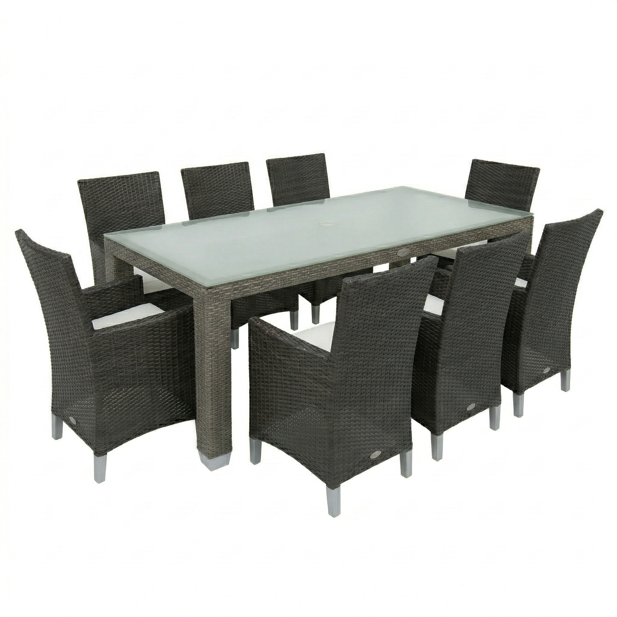 Outdoor dining set with a rectangular table and eight dining arm chairs on a white background. Patio set is a dark brown wicker color with a frosted glass top. The dining chairs have a high solid back  and arms with white cushions on them. 